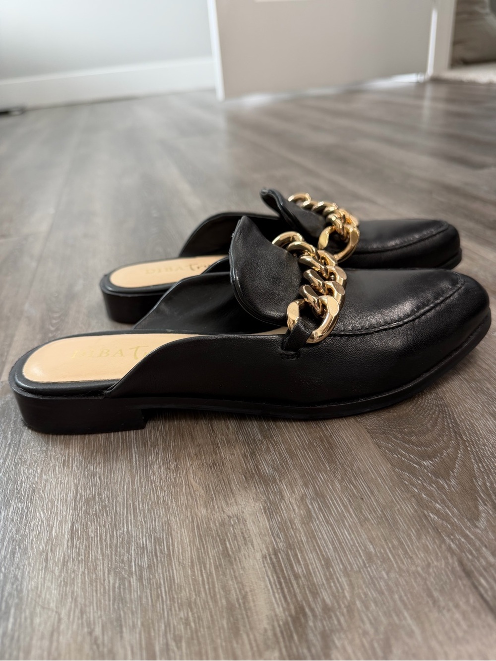 Black Leather Backless Mules with Gold Chain Accent